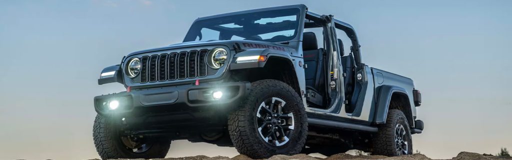 A Jeep Wrangler Rubicon with doors removed, designed for rugged off-road adventures.