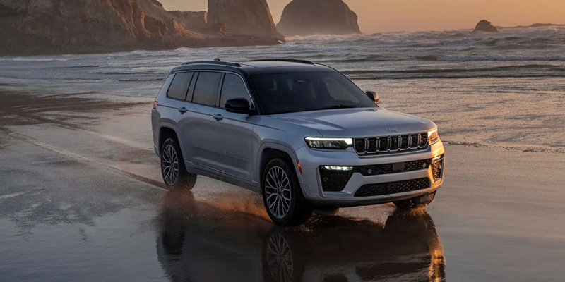 Jeep Grand Cherokee beside beach