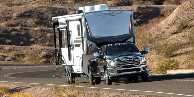 Black RAM Towing on road