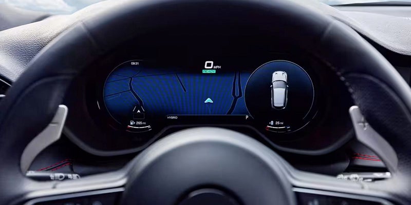 The digital dashboard of a modern Dodge Hornet is shown