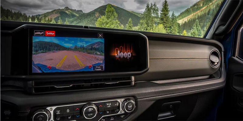 Jeep Gladiator backup camera display with mountain view
